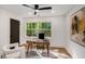Bright office space with hardwood floors, modern furnishings, and a large window at 2685 Glenvalley Dr, Decatur, GA 30032