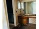 Bathroom vanity with aged mirror at 3038 Parc Lorraine, Lithonia, GA 30038