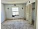 This bedroom features double closets, a window, and dated decor at 3038 Parc Lorraine, Lithonia, GA 30038