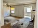The living room has a sliding glass door, a window, and a fireplace at 3038 Parc Lorraine, Lithonia, GA 30038
