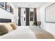 Bright bedroom with large windows, modern décor, and a comfortable layout at 388 Pratt Se Dr # 2123, Atlanta, GA 30315