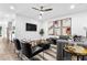 A spacious living room featuring a comfortable gray sectional and modern decor at 388 Pratt Se Dr # 2123, Atlanta, GA 30315