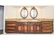 Bathroom vanity with dual sinks, granite countertops, and ornate mirrors at 4730 W Forest Peak, Marietta, GA 30066