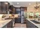 Gourmet kitchen boasts stainless steel appliances and granite countertops at 4730 W Forest Peak, Marietta, GA 30066