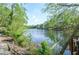 Scenic lake view captures the peaceful environment with lush trees surrounding the tranquil water at 4730 W Forest Peak, Marietta, GA 30066