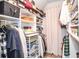 Organized walk-in closet with shelves, rods, and plenty of storage at 4730 W Forest Peak, Marietta, GA 30066