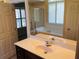 Bathroom featuring double sinks, granite countertop, walk-in shower and soaking tub at 533 Mount Gerizim Se Rd, Mableton, GA 30126
