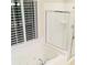 Close up on bright bathroom features a soaking tub under a window and a separate shower at 533 Mount Gerizim Se Rd, Mableton, GA 30126