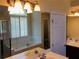 Bright bathroom features a double vanity, soaking tub under a window, and a separate shower at 533 Mount Gerizim Se Rd, Mableton, GA 30126