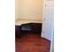 Office with dark hardwood floors and custom built in desk and cabinets at 533 Mount Gerizim Se Rd, Mableton, GA 30126