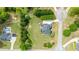 Aerial view of home, showcasing the expansive lot and mature trees at 5604 Mccullers Ln, Loganville, GA 30052