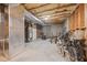 Basement includes an exercise area, water heater, concrete walls and pipes on the ceiling at 5604 Mccullers Ln, Loganville, GA 30052
