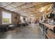 Spacious workshop with tools, work benches, and ample natural light from the windows at 5604 Mccullers Ln, Loganville, GA 30052