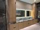 Bathroom featuring a dual sink vanity with granite countertop and a lighted mirror at 820 Moores Mill Nw Rd, Atlanta, GA 30327