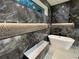 Elegant bathroom showcasing marble tile, freestanding tub, and sleek fixtures at 820 Moores Mill Nw Rd, Atlanta, GA 30327