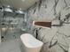 Modern bathroom featuring marble tile, soaking tub and glass enclosed shower with rain head at 820 Moores Mill Nw Rd, Atlanta, GA 30327