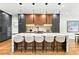 Modern kitchen with a large island, marble countertops, and stainless steel appliances at 820 Moores Mill Nw Rd, Atlanta, GA 30327