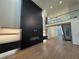 Open living area with a fireplace feature wall and hardwood floors at 820 Moores Mill Nw Rd, Atlanta, GA 30327