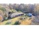 A ranch-style home with a brick facade, a PODS moving container, and a spacious lot at 98 Almon Church Rd, Covington, GA 30014