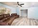 Inviting living room featuring durable flooring, comfortable seating, and neutral walls at 98 Almon Church Rd, Covington, GA 30014