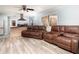 Spacious living room with hardwood-style flooring, comfortable seating, and natural light at 98 Almon Church Rd, Covington, GA 30014