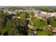 Aerial view of a residential area with lush green trees offering privacy and shade at 2685 Buena Vista Ave, Doraville, GA 30340