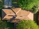 Aerial view of the home showcasing a well-maintained roof and lush surrounding landscape at 2685 Buena Vista Ave, Doraville, GA 30340