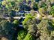 Aerial view of a neighborhood with mature trees at 2685 Buena Vista Ave, Doraville, GA 30340