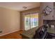 Dining area featuring hardwood floors, and sliding glass doors to the sunroom at 2685 Buena Vista Ave, Doraville, GA 30340