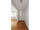 Inviting entryway featuring hardwood floors and a modern front door at 2685 Buena Vista Ave, Doraville, GA 30340