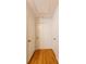 Bright hallway with hardwood floors and multiple doorways at 2685 Buena Vista Ave, Doraville, GA 30340