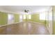 Bright, open living room features hardwood floors and large windows at 2685 Buena Vista Ave, Doraville, GA 30340