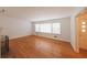 Bright living room with hardwood floors and large windows at 2685 Buena Vista Ave, Doraville, GA 30340