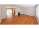 Hardwood floors, fireplace, and sliding door to backyard at 2685 Buena Vista Ave, Doraville, GA 30340