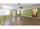 Spacious living room with natural light and hardwood style flooring at 2685 Buena Vista Ave, Doraville, GA 30340