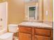 Bathroom with a combination bathtub and shower, wooden vanity, and tile floors at 3243 Timber Rdg, College Park, GA 30349