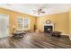 Living room with a fireplace and laminate wood flooring at 3243 Timber Rdg, College Park, GA 30349