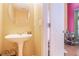 Powder room with pedestal sink and decorative mirror at 3243 Timber Rdg, College Park, GA 30349