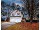 Charming two-story home with a two-car garage and well-manicured lawn at 3371 Metro Way, Snellville, GA 30039