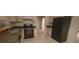 Well-equipped kitchen with gas range oven and stainless steel sink at 3371 Metro Way, Snellville, GA 30039