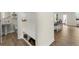 Convenient mudroom with built-in bench and storage, adjacent to a half bath and an open-concept living area at 350 Hayden Cir, Woodstock, GA 30189