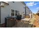 Exterior view showcasing the patio, grill, and AC unit in the backyard of the house at 350 Hayden Cir, Woodstock, GA 30189