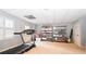 Basement with a treadmill, shelving, and access to storage; great for a home gym or recreation area at 914 Denmeade Sw Walk, Marietta, GA 30064