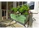Charming window box with pansies adding curb appeal to this home's exterior at 914 Denmeade Sw Walk, Marietta, GA 30064