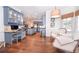 Open floor plan with stylish blue cabinets and island that leads to kitchen at 914 Denmeade Sw Walk, Marietta, GA 30064