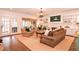 Bright living room with a cozy seating arrangement and access to the outdoors at 914 Denmeade Sw Walk, Marietta, GA 30064
