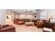 Spacious living room with neutral paint, carpeted floors, and multiple seating areas at 914 Denmeade Sw Walk, Marietta, GA 30064