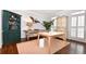 Sunlit home office with custom built-ins, hardwood floors, and neutral decor at 914 Denmeade Sw Walk, Marietta, GA 30064