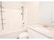 Bright bathroom featuring a shower-tub combination, white cabinets and sink with granite countertop at 191 Fairview Oak Trl, Dallas, GA 30157