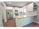 Modern kitchen with stainless steel appliances, granite countertops, and white cabinetry perfect for cooking at 191 Fairview Oak Trl, Dallas, GA 30157